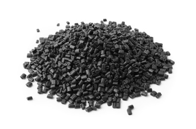 Photo of Pile of black plastic granules isolated on white