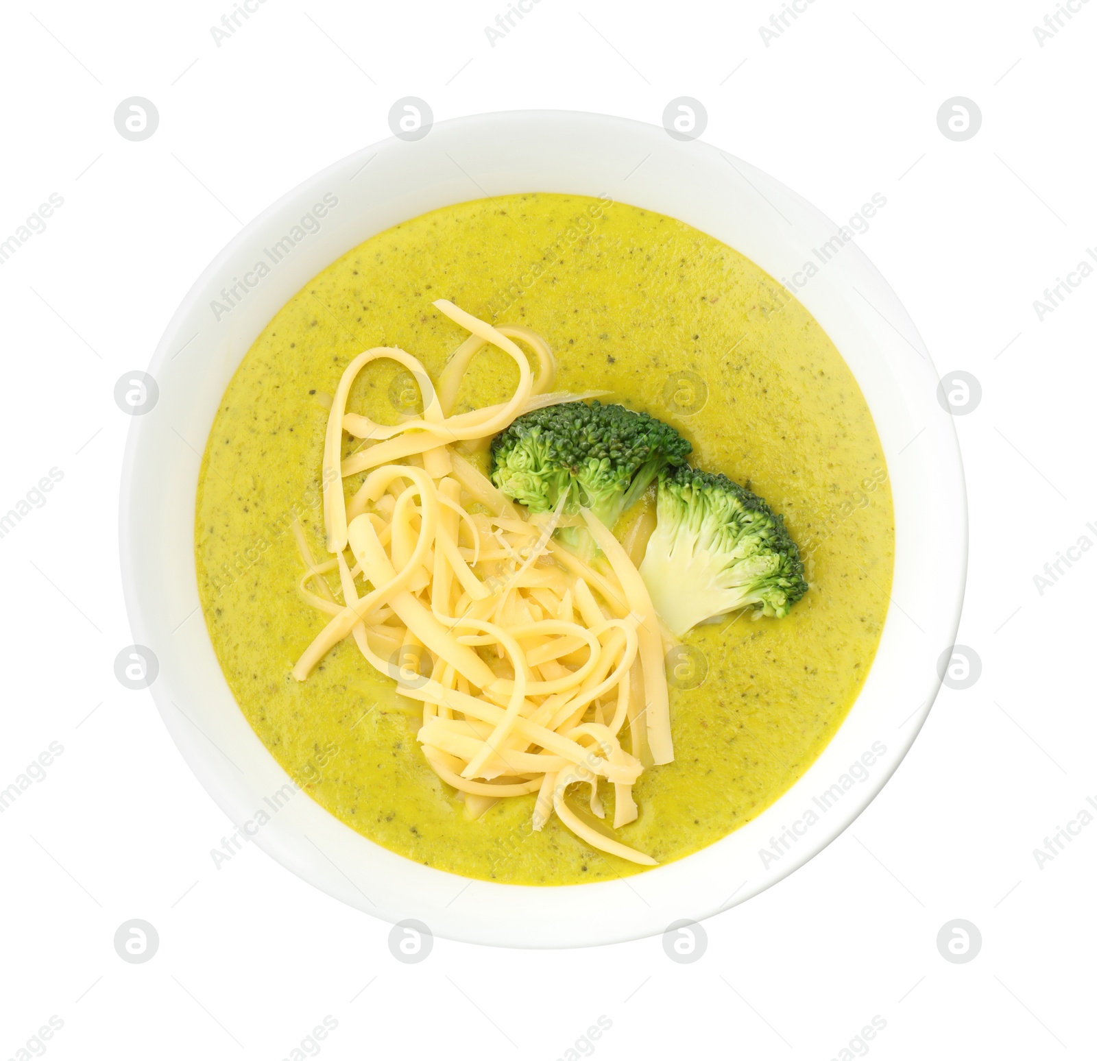 Photo of Delicious broccoli cream soup in bowl isolated on white, top view