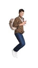 Photo of Teenage boy with backpack jumping on white background