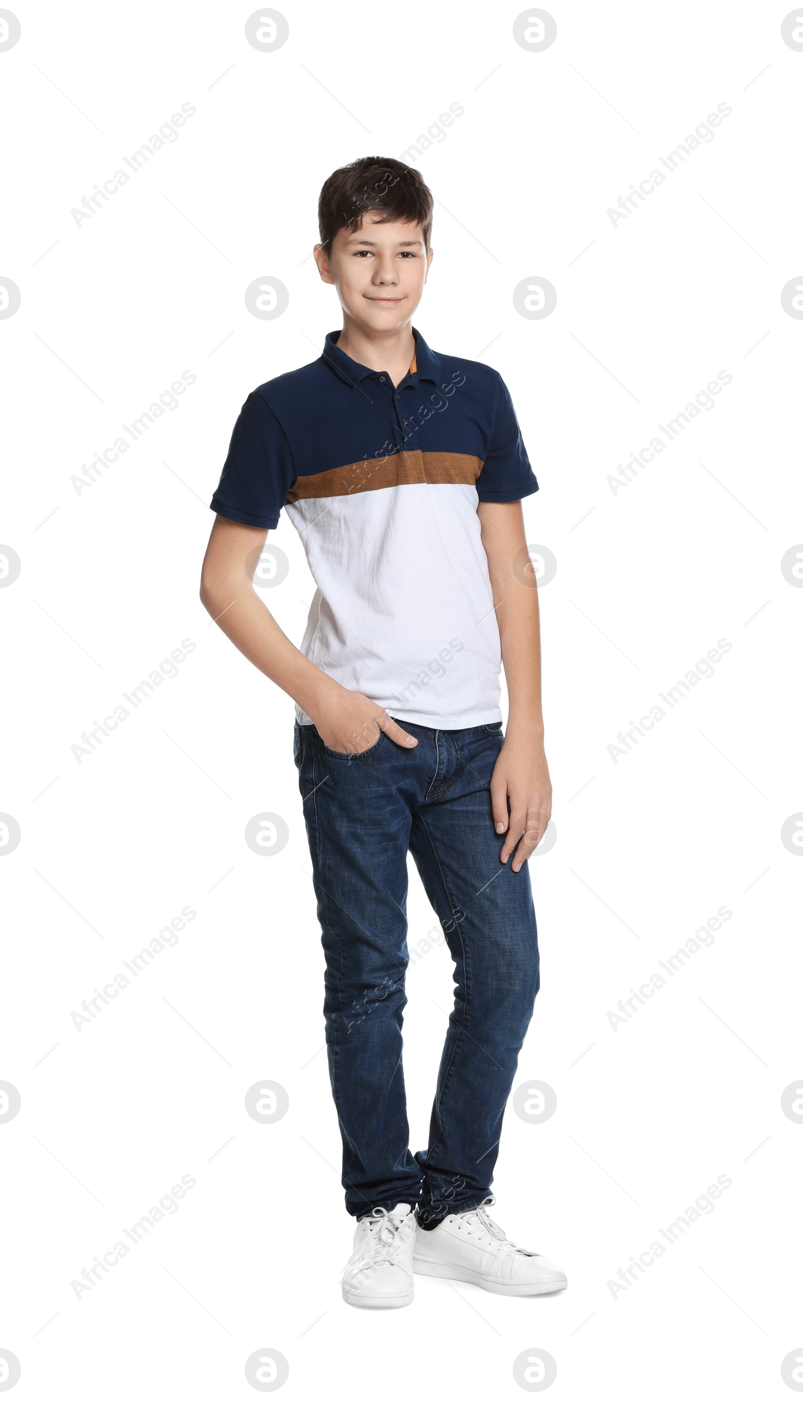 Photo of Full length portrait of teenage boy on white background