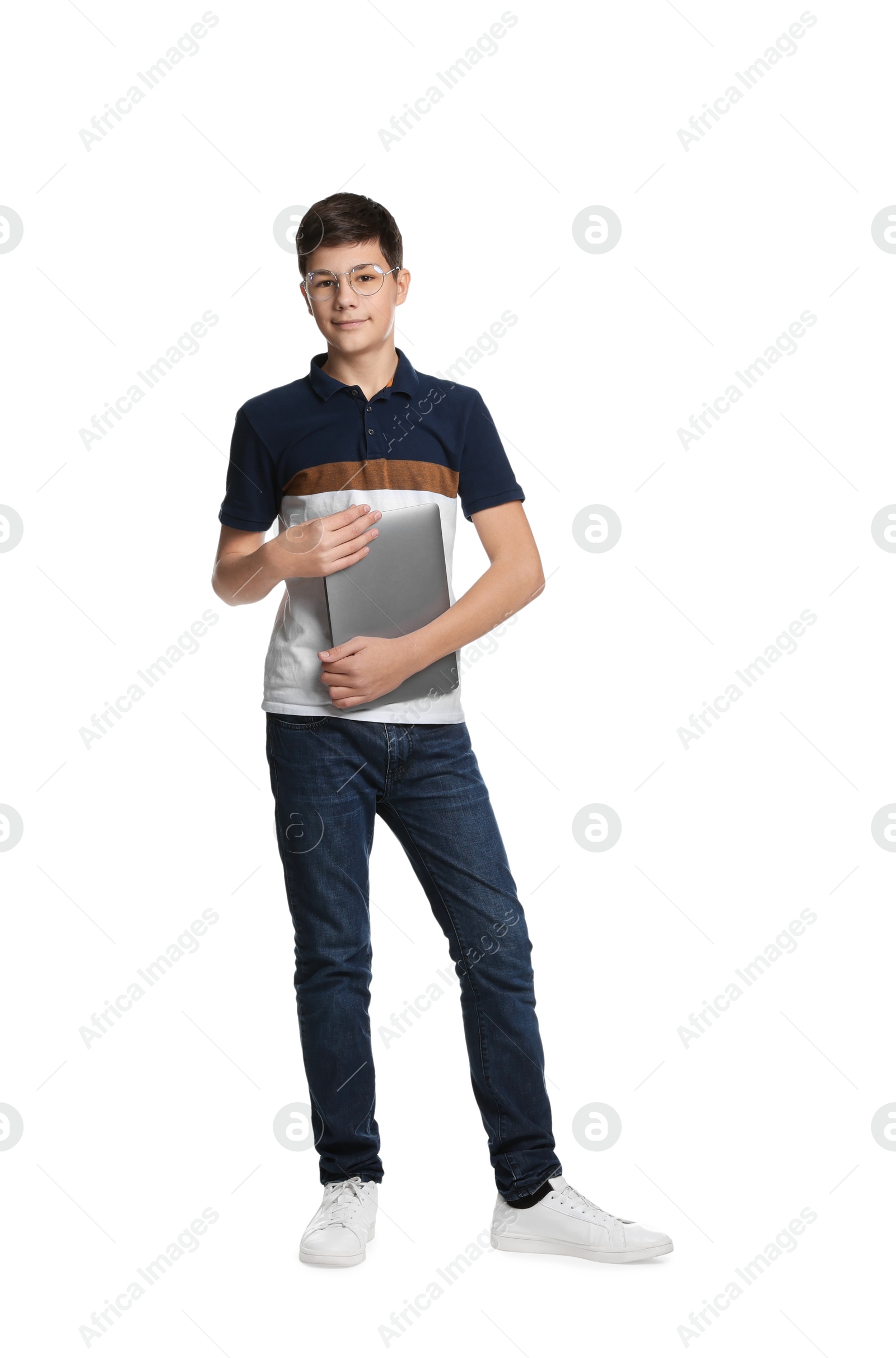 Photo of Full length portrait of teenage boy with laptop on white background