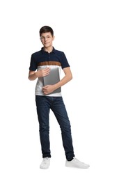 Photo of Full length portrait of teenage boy with laptop on white background