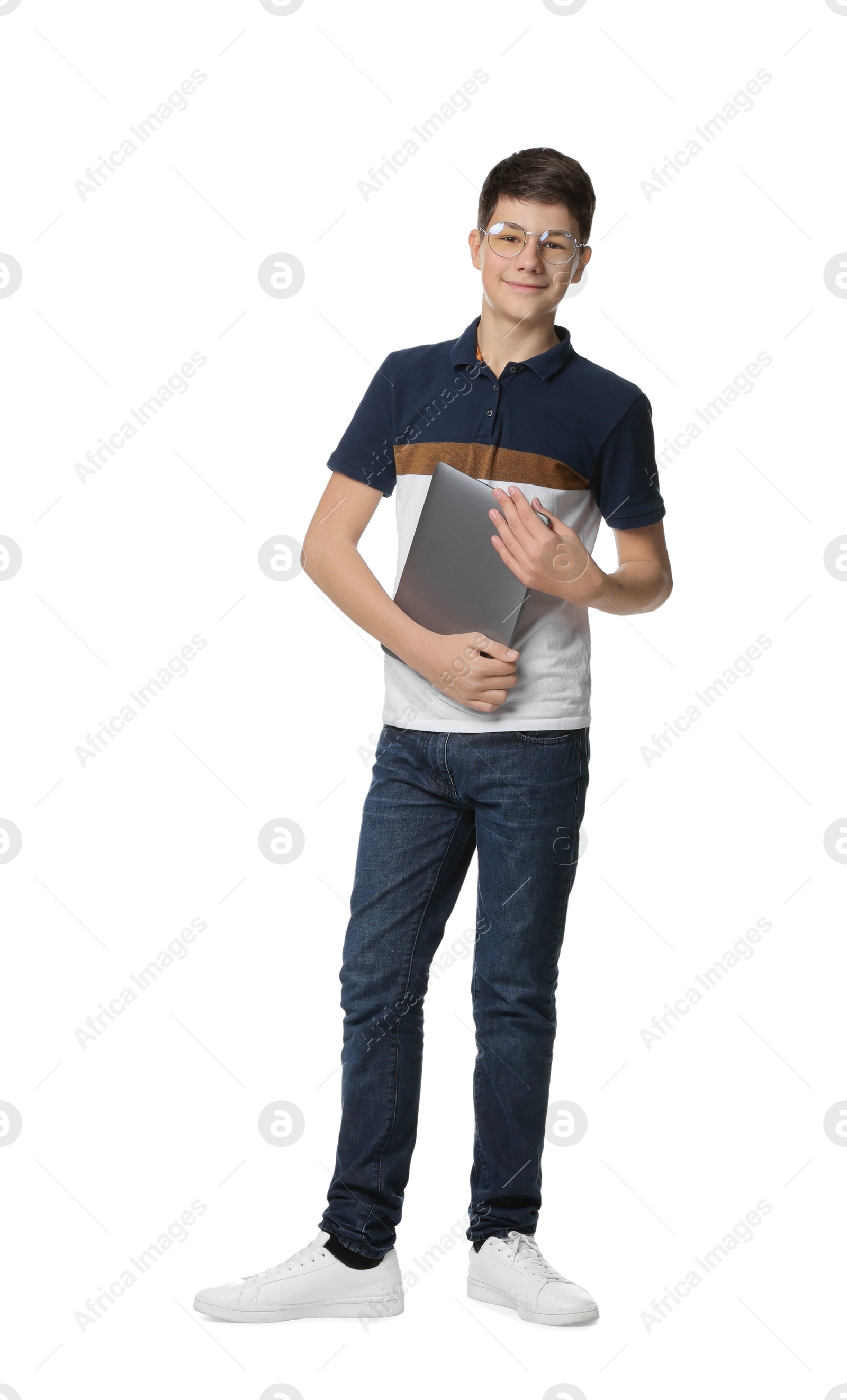 Photo of Full length portrait of teenage boy with laptop on white background