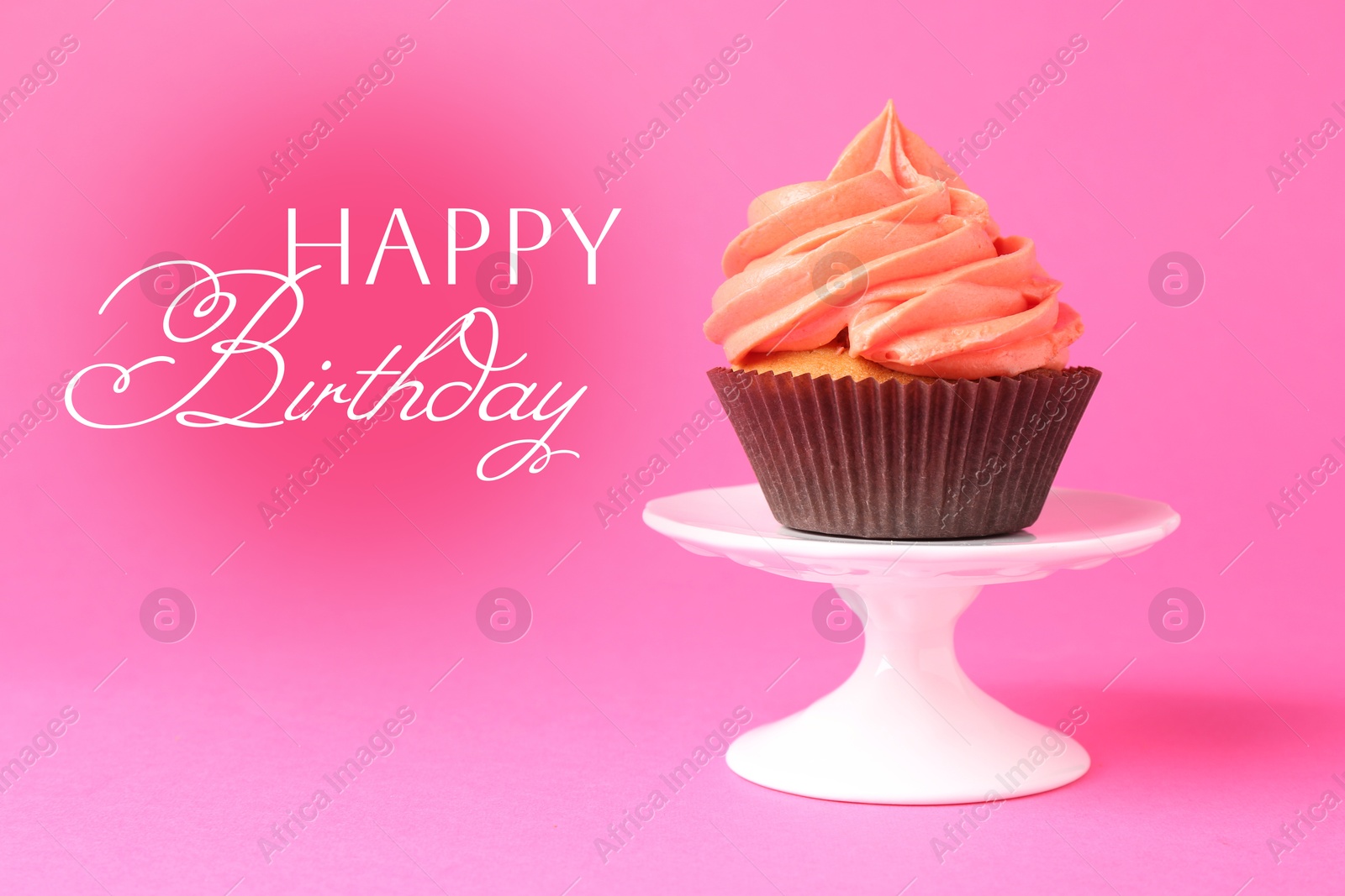 Image of Happy Birthday greeting card. Sweet cupcake on pink background