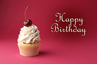 Image of Happy Birthday greeting card. Sweet cupcake with cherry on crimson color background