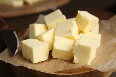 Photo of Pieces of fresh butter on table, closeup