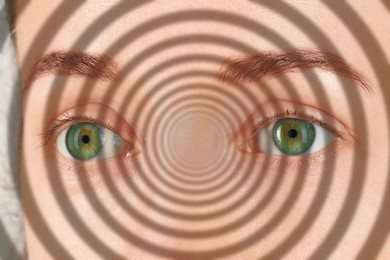 Image of Hypnotized woman, closeup. Spiral symbolizing hypnotic effect