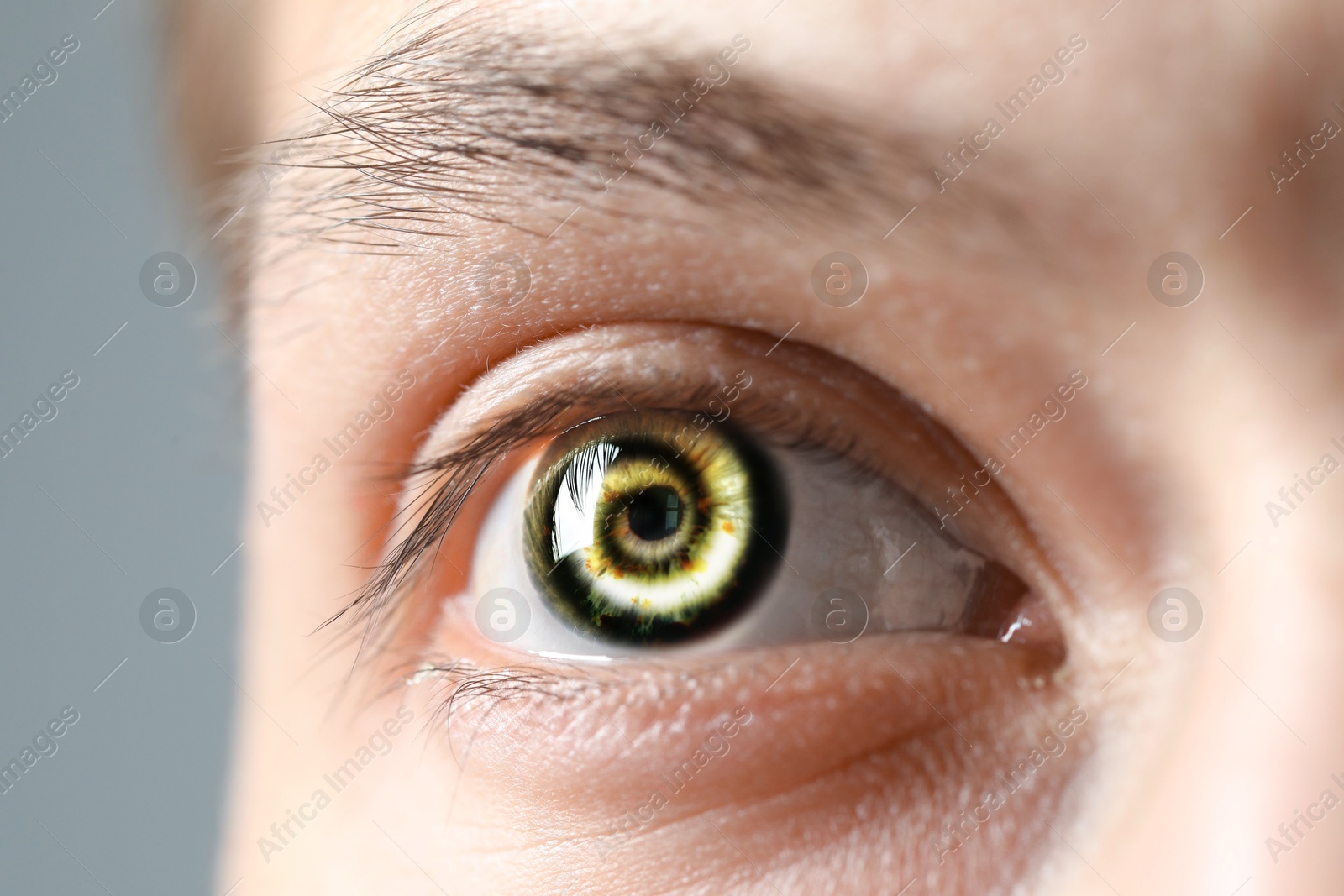 Image of Hypnosis. Spiral symbolizing hypnotic effect in man's eye, closeup