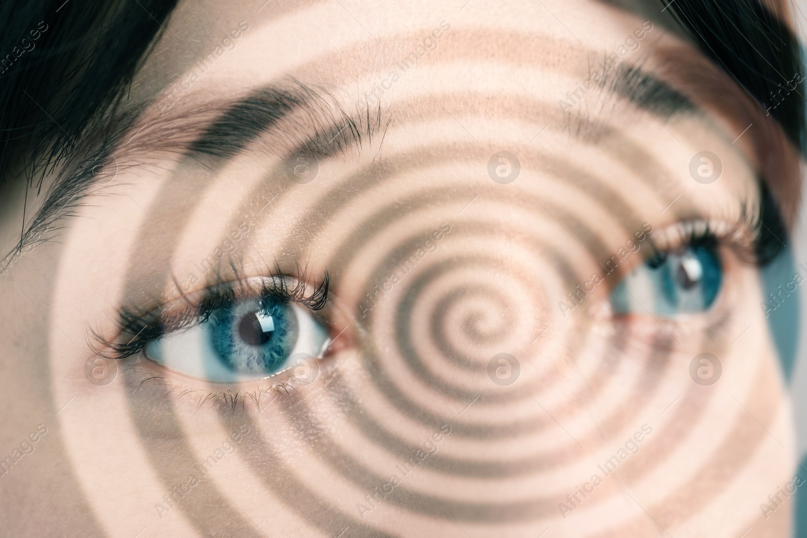 Image of Hypnotized woman, closeup. Spiral symbolizing hypnotic effect