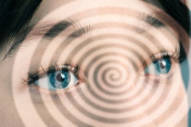 Image of Hypnotized woman, closeup. Spiral symbolizing hypnotic effect