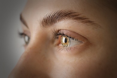 Image of Hypnosis. Spiral symbolizing hypnotic effect in woman's eye, closeup