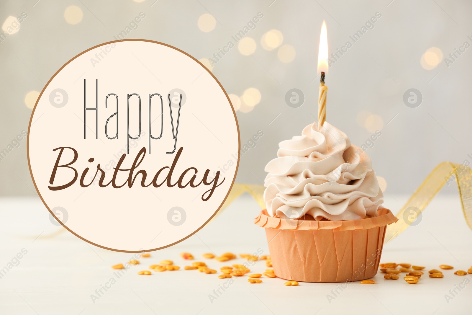 Image of Happy Birthday greeting card. Sweet cupcake with burning candle on grey background