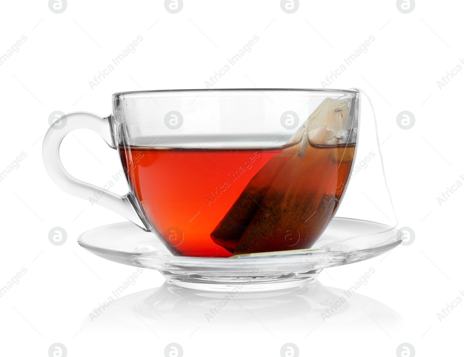 Photo of Cup with teabag isolated on white. Brewing aromatic tea