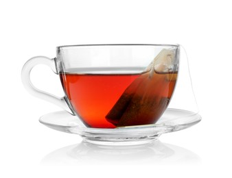 Photo of Cup with teabag isolated on white. Brewing aromatic tea