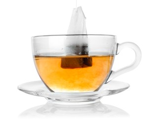 Photo of Cup with teabag isolated on white. Brewing aromatic tea