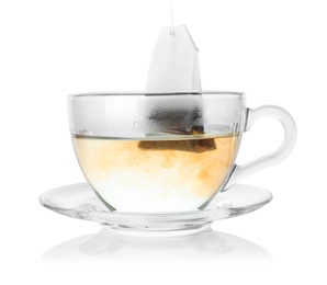 Photo of Cup with teabag isolated on white. Brewing aromatic tea