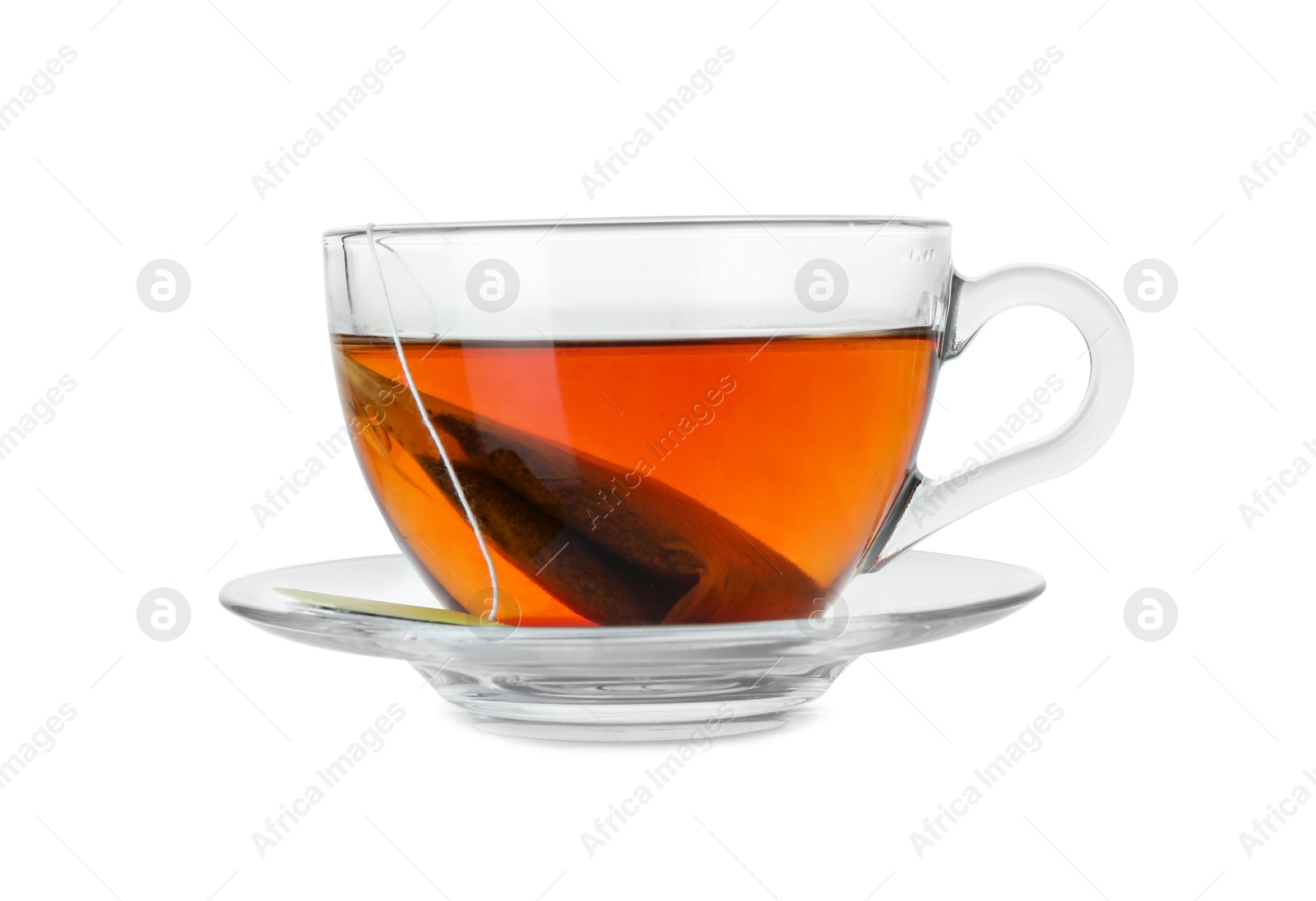 Photo of Brewing aromatic tea. Cup with teabag isolated on white