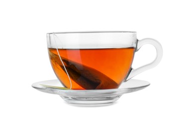 Photo of Brewing aromatic tea. Cup with teabag isolated on white