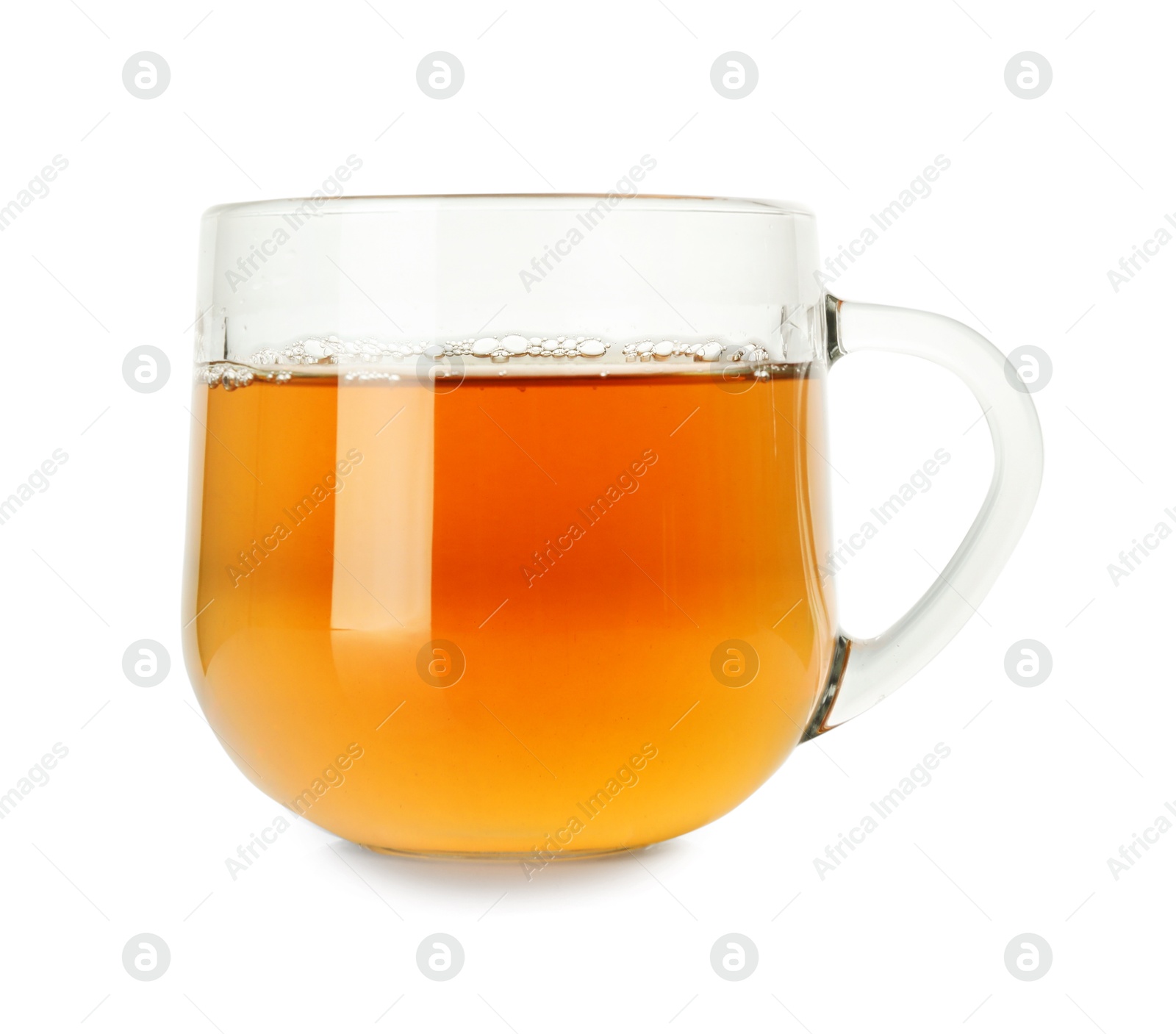 Photo of Aromatic tea in glass cup isolated on white