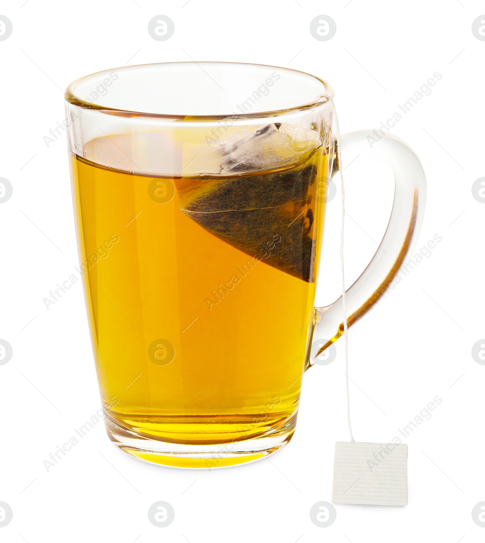 Photo of Tea bag in glass cup with hot drink isolated on white