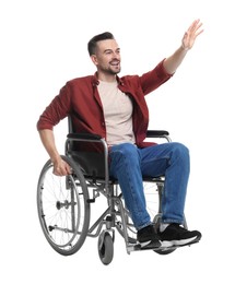 Photo of Man in wheelchair waving at someone on white background