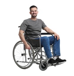 Photo of Smiling man in wheelchair on white background