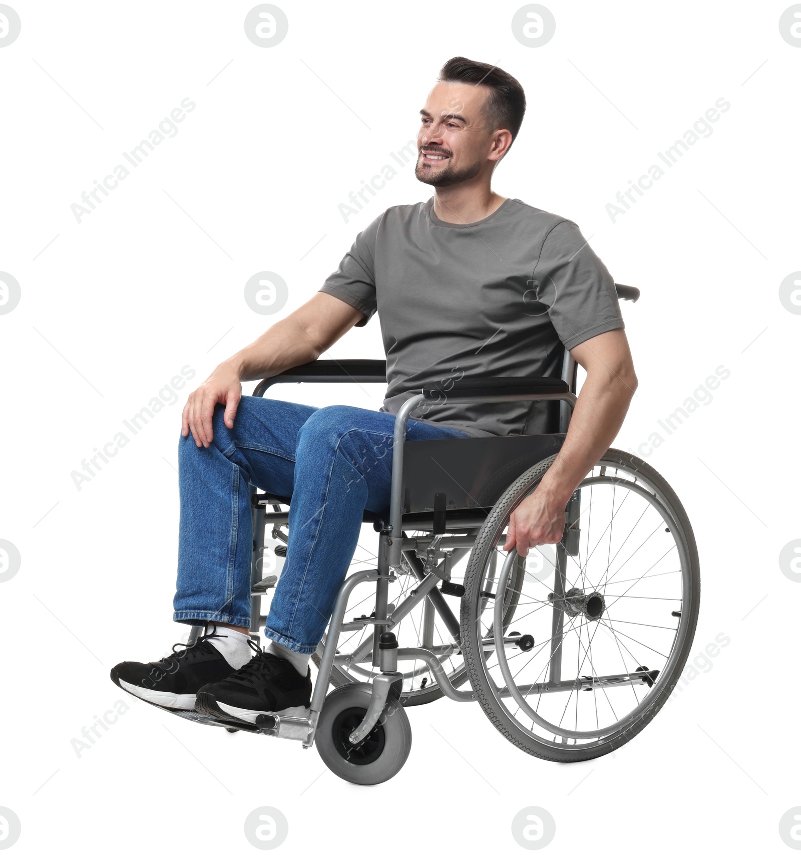 Photo of Smiling man in wheelchair on white background