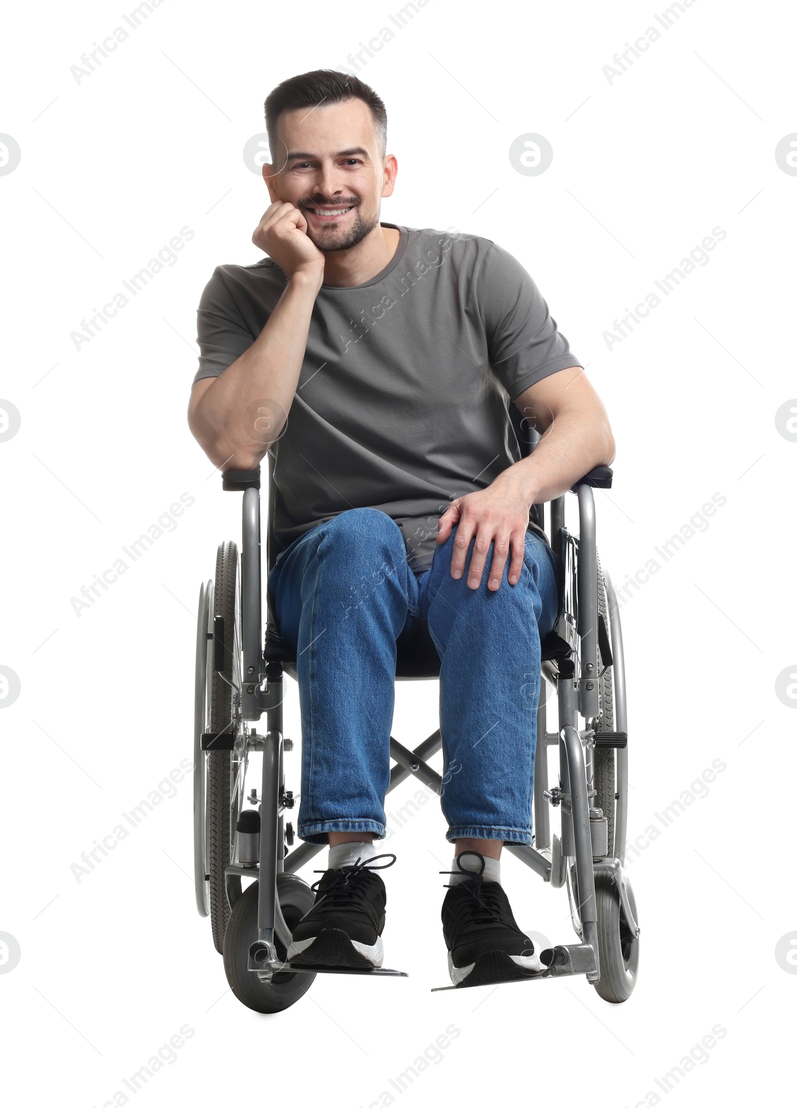 Photo of Smiling man in wheelchair on white background