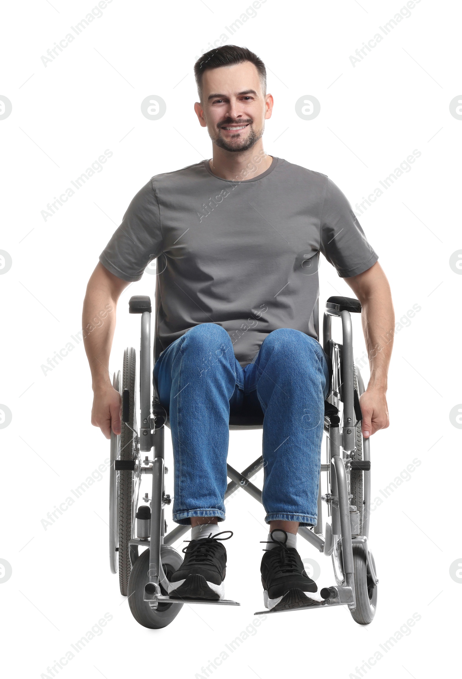 Photo of Smiling man in wheelchair on white background