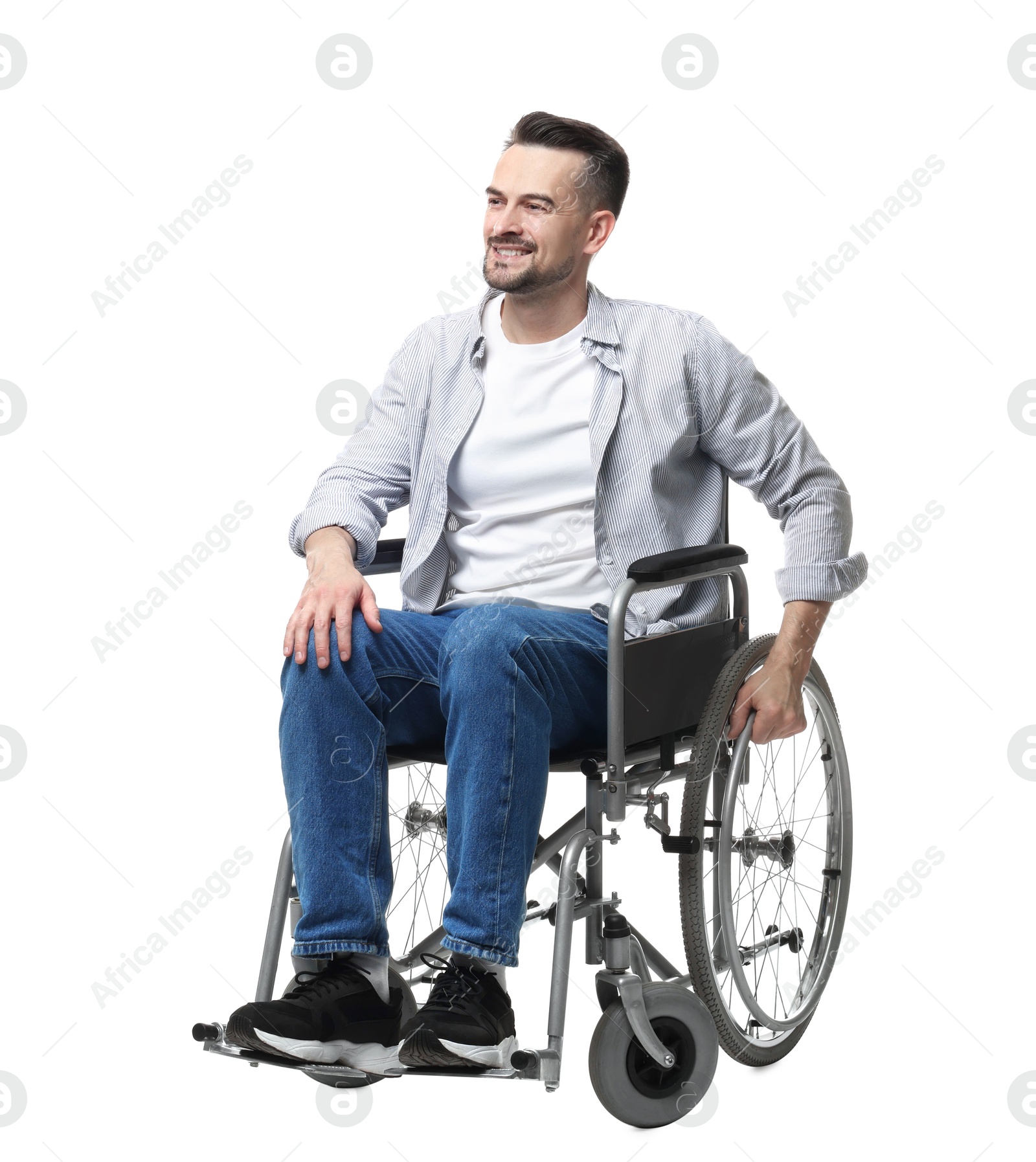 Photo of Smiling man in wheelchair on white background