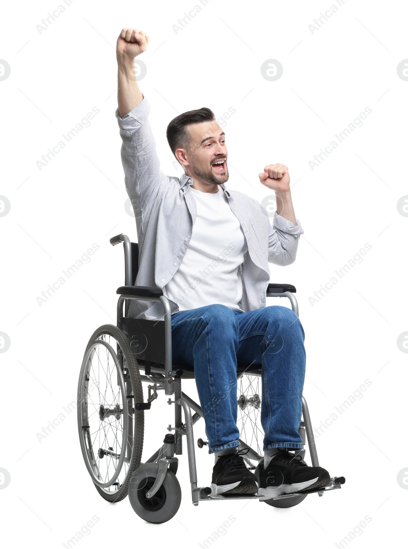 Photo of Excited man in wheelchair on white background