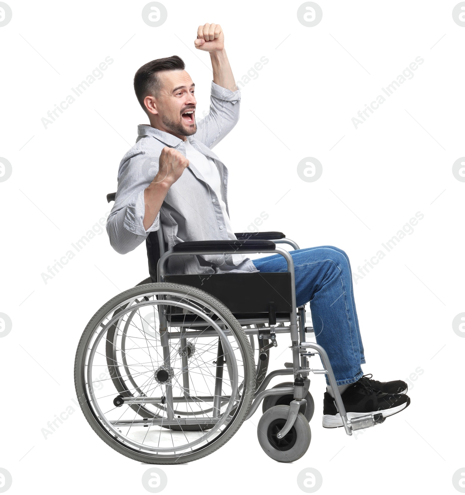 Photo of Excited man in wheelchair on white background