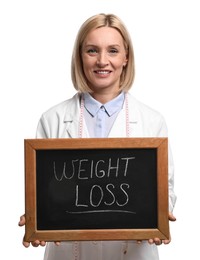 Photo of Happy nutritionist holding small blackboard with words Weight loss on white background