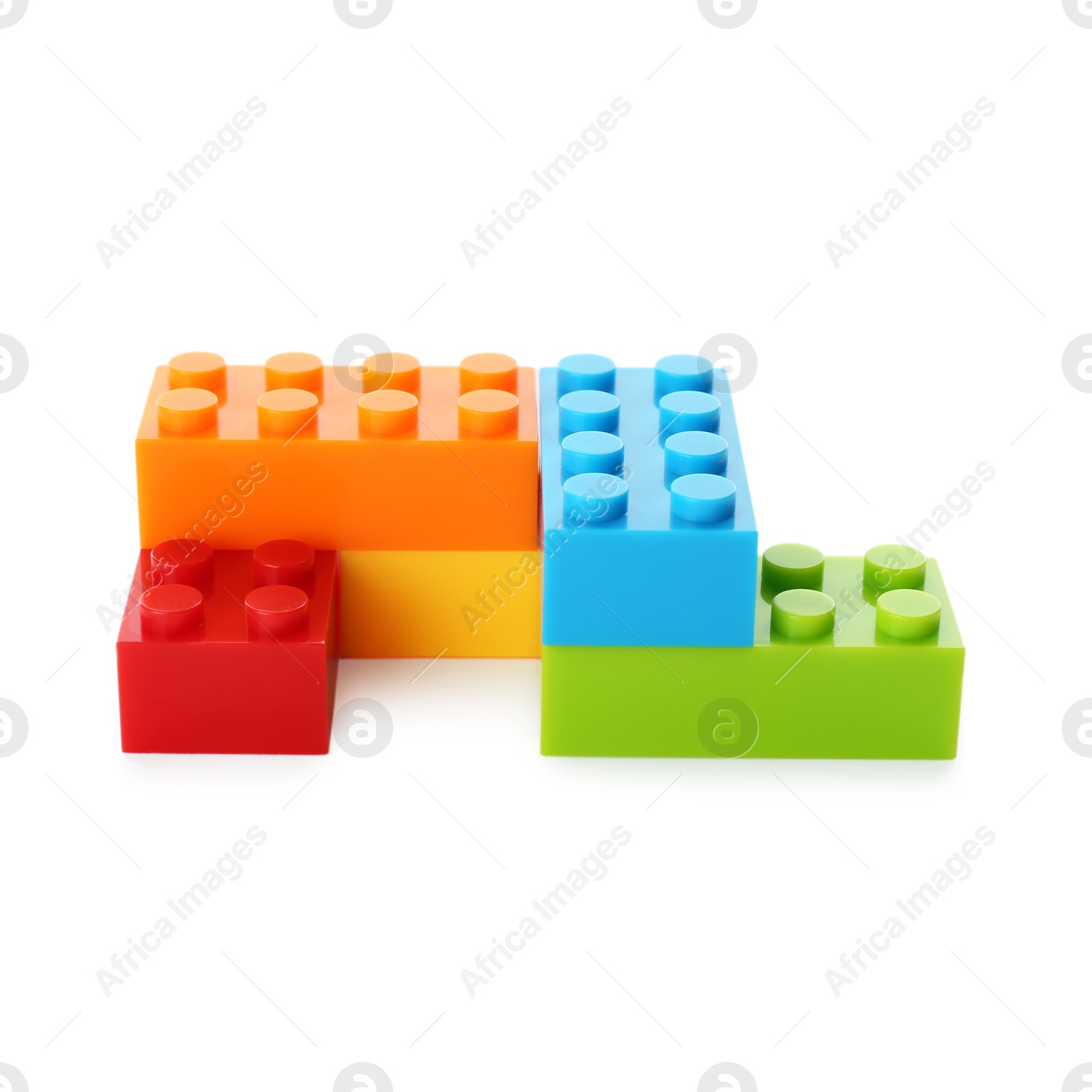 Photo of Construction toy. Figure made with building bricks isolated on white