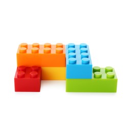 Photo of Construction toy. Figure made with building bricks isolated on white