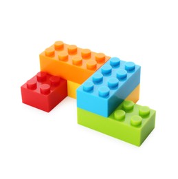 Photo of Construction toy. Figure made with building bricks isolated on white