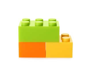 Photo of Construction toy. Figure made with building bricks isolated on white