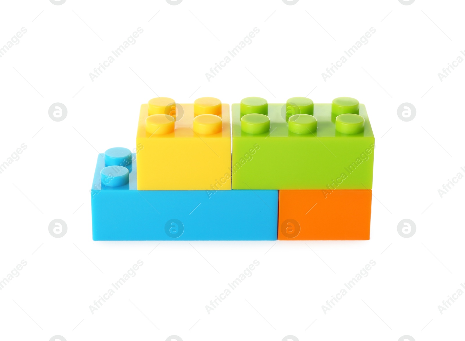 Photo of Construction toy. Figure made with building bricks isolated on white