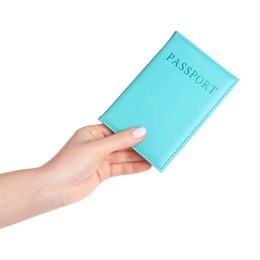 Photo of Woman holding passport in turquoise cover on white background, closeup