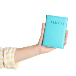 Photo of Woman holding passport in turquoise cover on white background, closeup