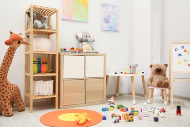 Photo of Child's room interior with many different toys