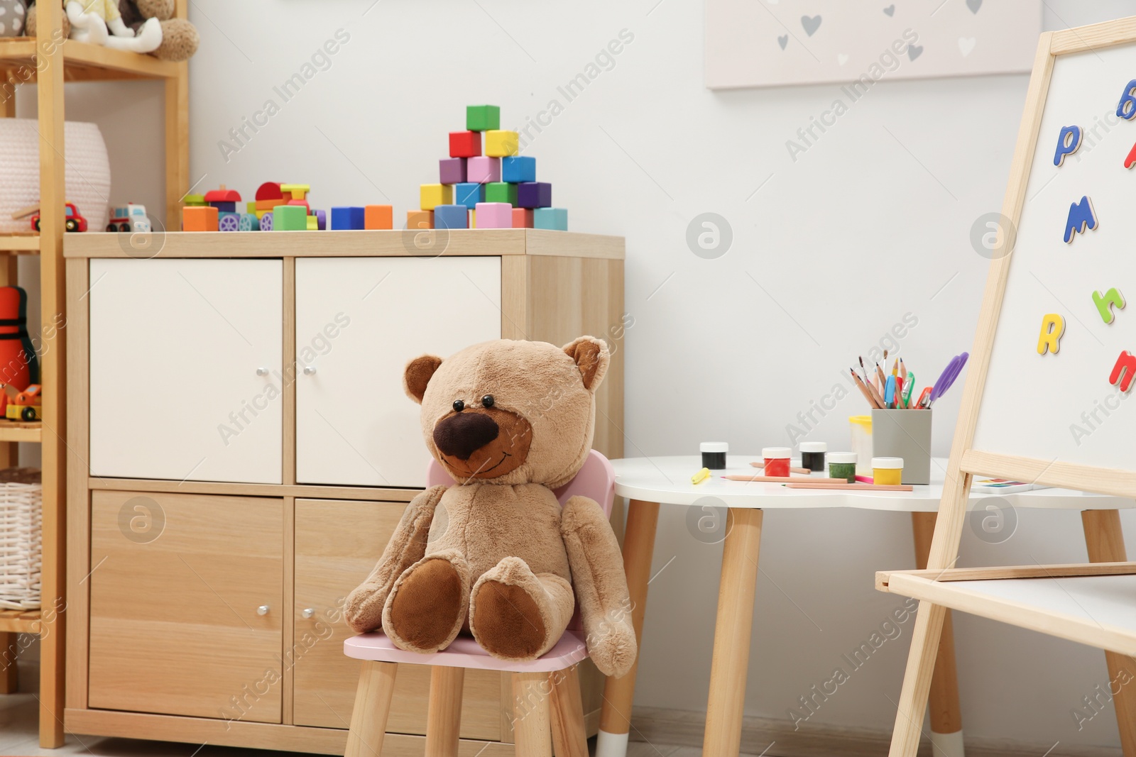 Photo of Child's room interior with many different toys