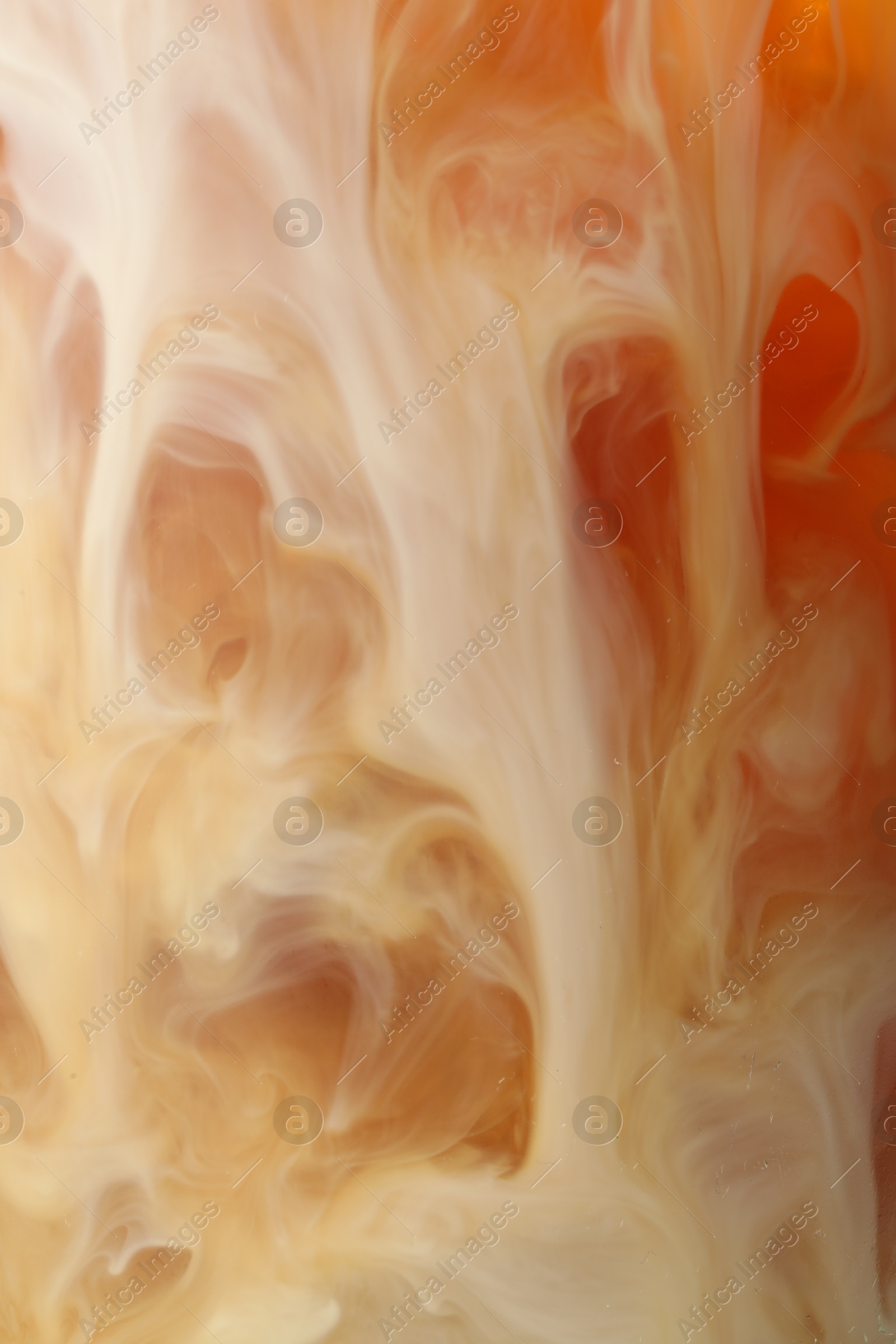 Photo of Refreshing coffee with ice and milk as background, closeup