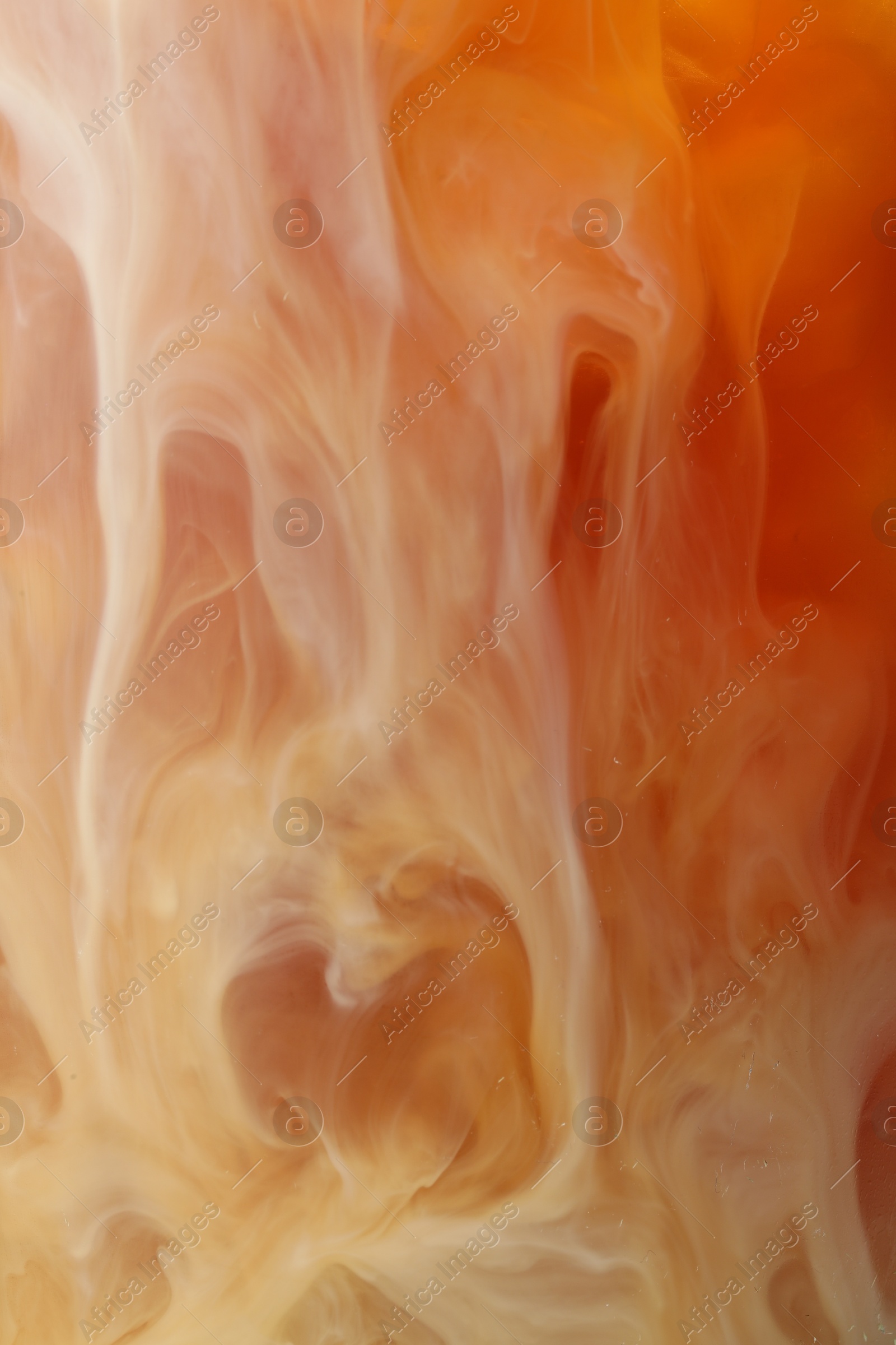 Photo of Refreshing coffee with ice and milk as background, closeup