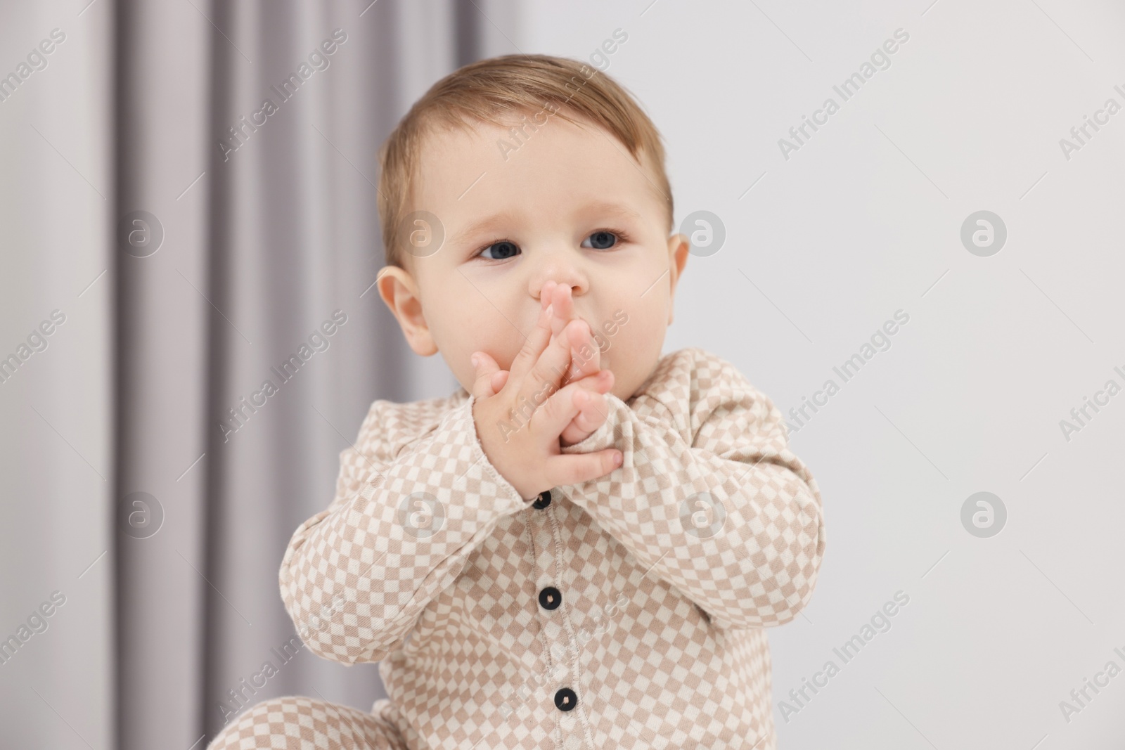 Photo of Portrait of sweet little baby at home