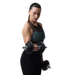 Beautiful woman in sportswear training with barbells on white background