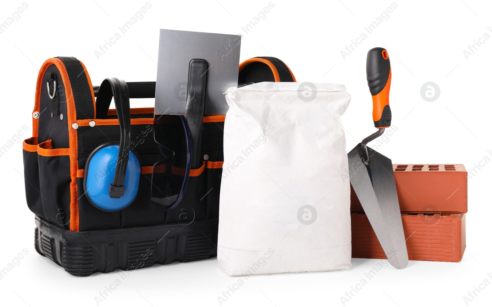 Photo of Bag with construction tools and building materials isolated on white