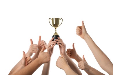 Photo of Group of people with golden trophy showing thumbs up on white background, closeup