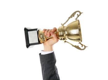 Man with golden trophy cup on white background, closeup