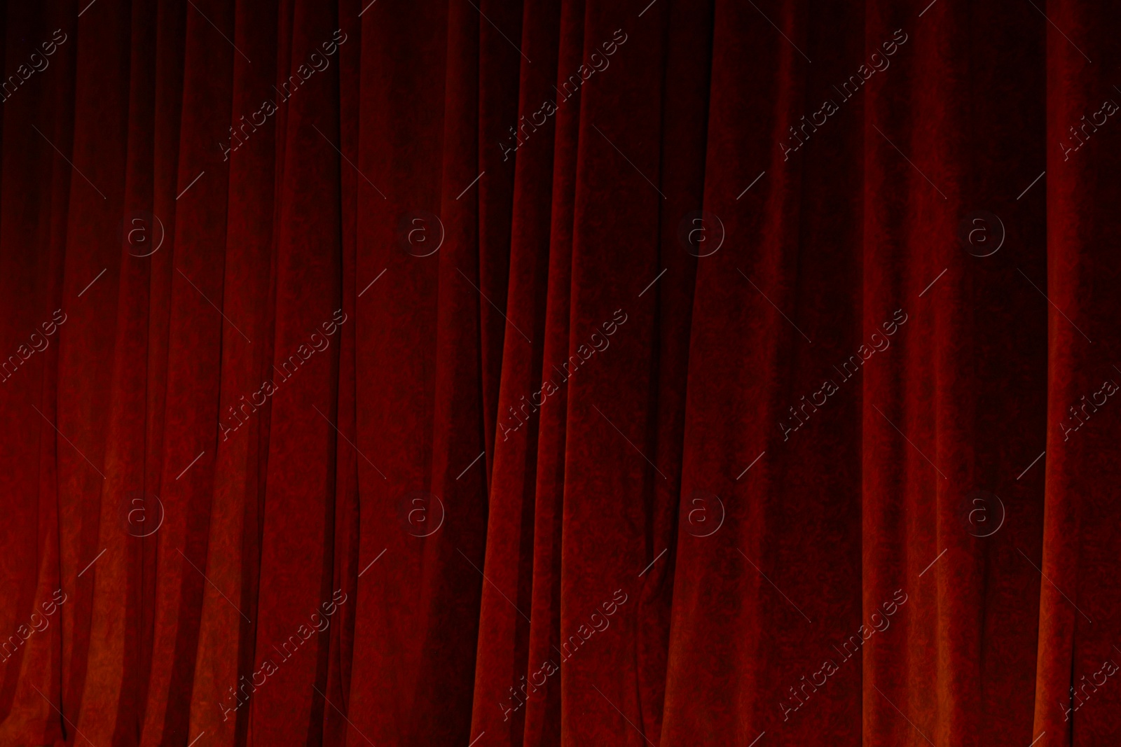 Photo of Elegant curtains in theatre as background, closeup